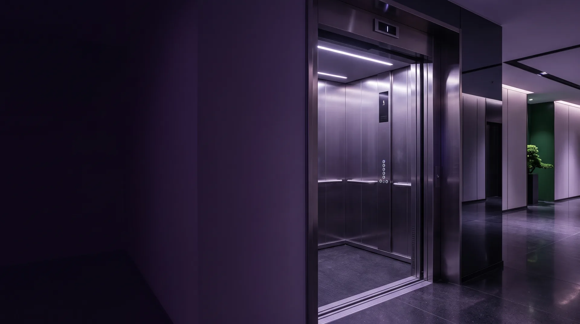 Newly modernized elevator cabin with a sleek stainless steel interior